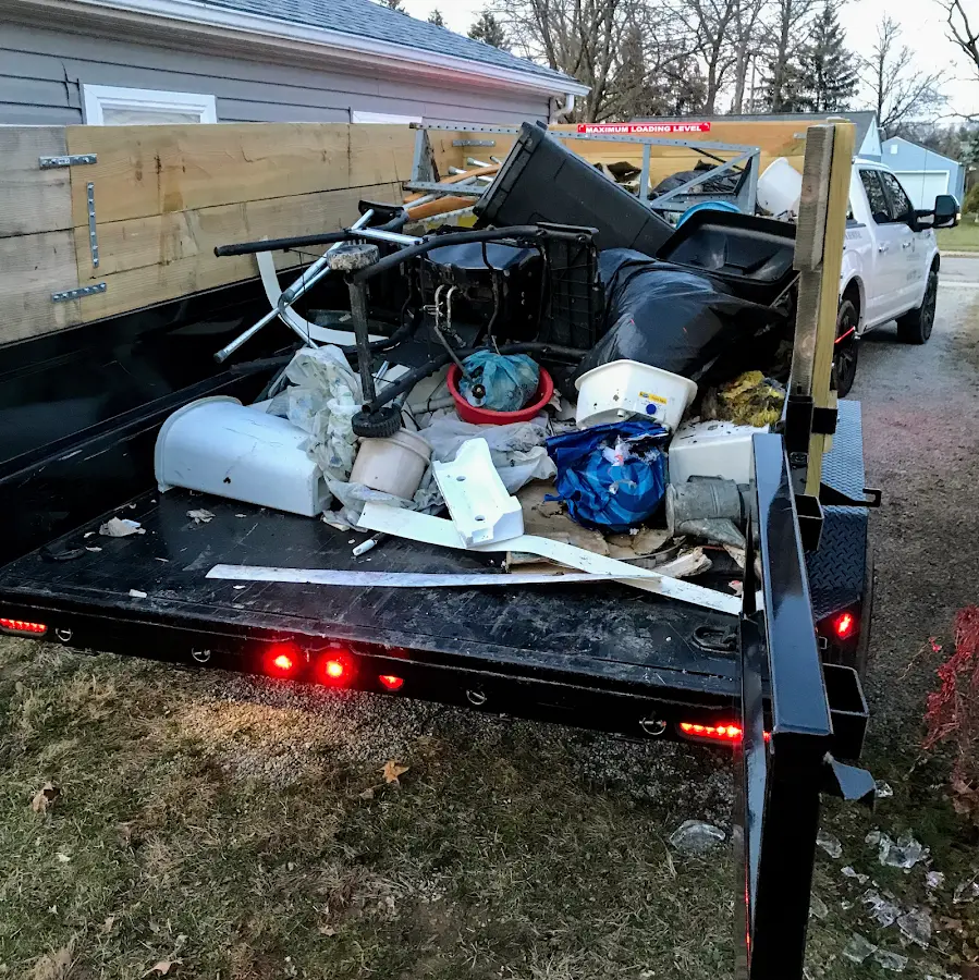 Roll-off dumpster delivered to a residential driveway in Suffern